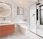 Onice Silver onyx-look porcelain in a bathroom with an orange vanity