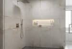 Stone Bianco travertine-look porcelain in a shower with a recessed niche
